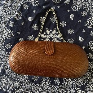 Vintage The SAK woven clutch